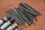 4 Unused LAL 7/8" Tap Extractors & some spare fingers for other sizes. 80214827 - Image 4